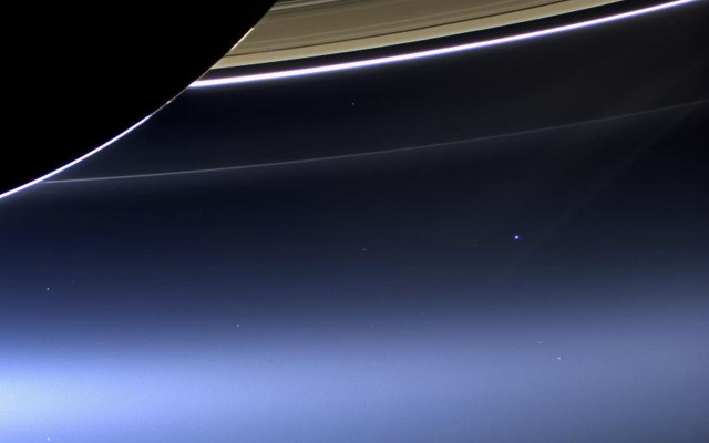 Saturn hubble blue streak distant free wallpaper - medium preview image