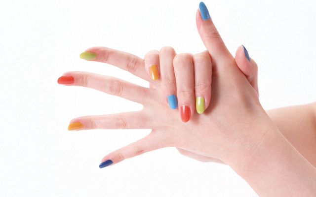 Woman hand multicolored nails ring free wallpaper - medium preview image