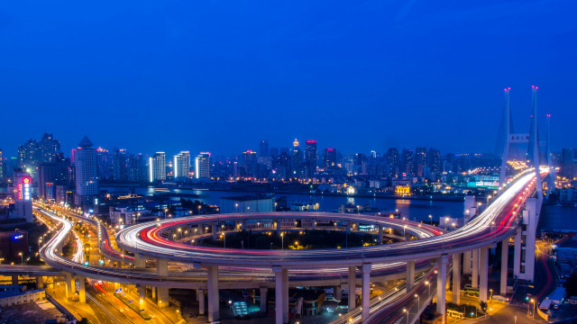 City skyline highway bridge nighttime free wallpaper - medium preview image
