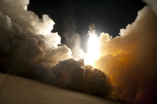 Rocket flying clouds sky night free wallpaper - medium preview image