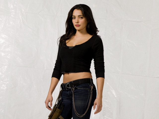 Woman black top jeans purse free wallpaper - medium preview image