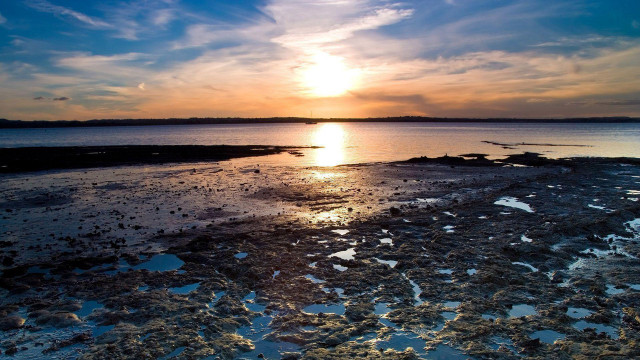 Sunset over water sky clouds free wallpaper - medium preview image