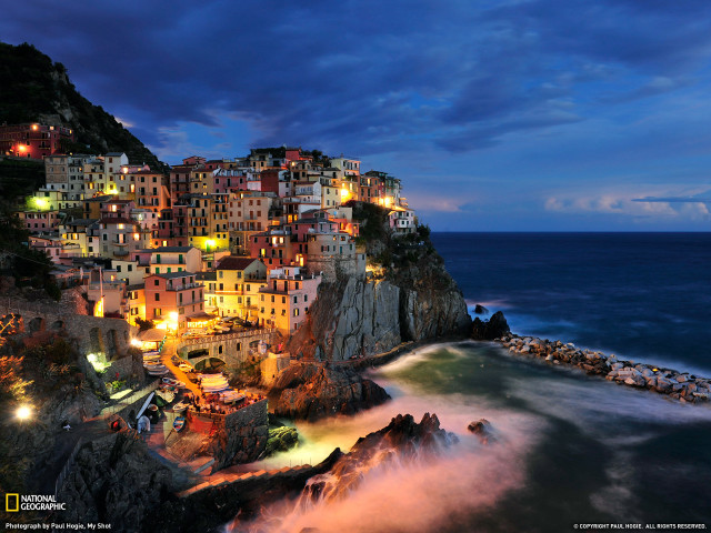Town cliff ocean night lights free wallpaper - medium preview image