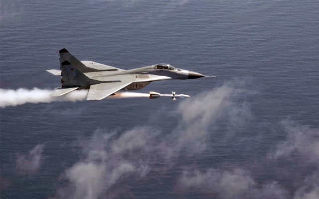 Jet flying white smoke trail free wallpaper - medium preview image