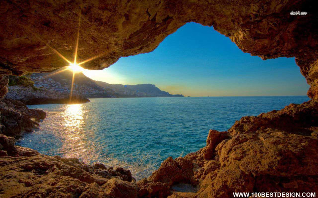 Ocean view cave beach sunset free wallpaper - medium preview image
