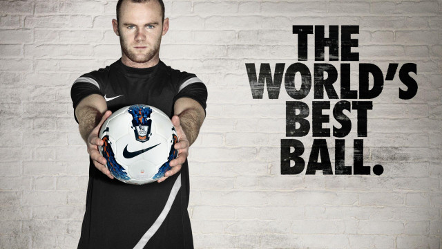 Man holding soccer ball worlds free wallpaper - medium preview image
