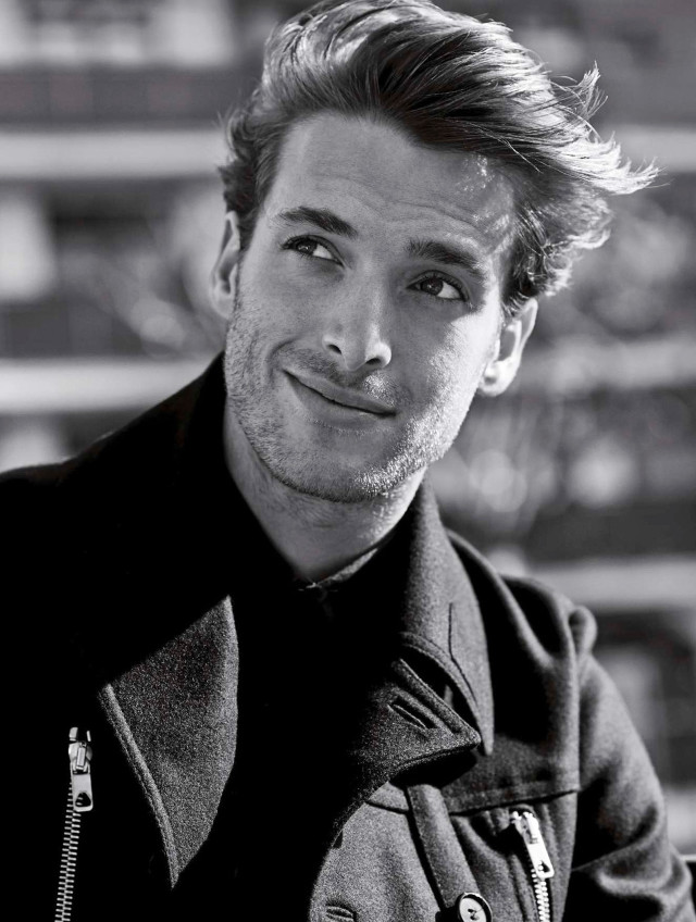 Man jacket smiling camera building free wallpaper - medium preview image