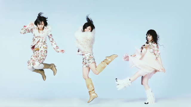 Women jumping floral outfits dog free wallpaper - medium preview image