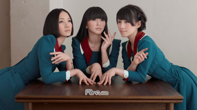 Three women sitting table hands free wallpaper - medium preview image