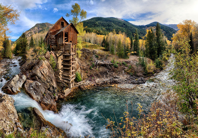 Wooden structure cliff river mountains free wallpaper - medium preview image