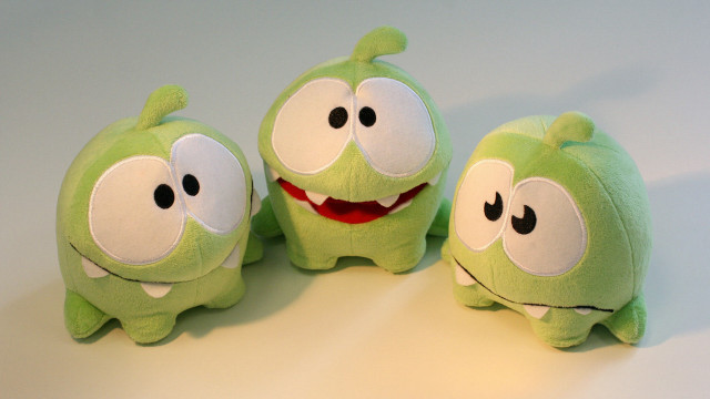 Green stuffed animals with eyes free wallpaper - medium preview image