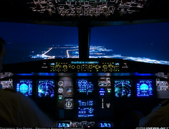 Man cockpit plane night lights free wallpaper - medium preview image