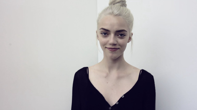 Woman ponytail smile black shirt free wallpaper - medium preview image