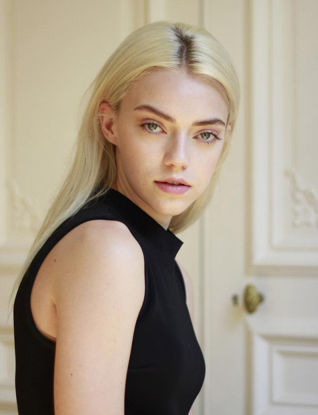 Blonde woman black top door free wallpaper - medium preview image