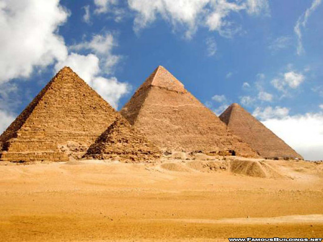Pyramids desert cloudy sky background free wallpaper - medium preview image
