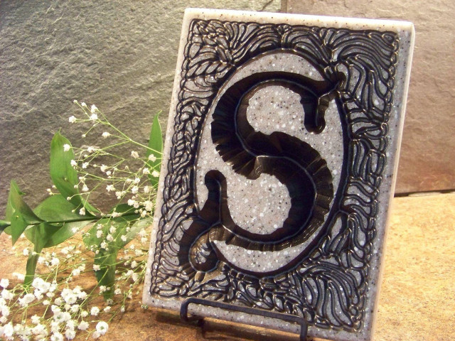 Decorative sign snake flowers stone free wallpaper - medium preview image