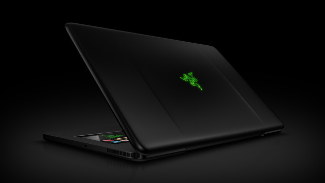 Laptop green leaf black background free wallpaper - medium preview image