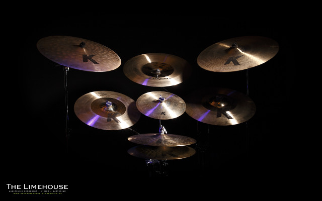Cymbals black table person standing free wallpaper - medium preview image