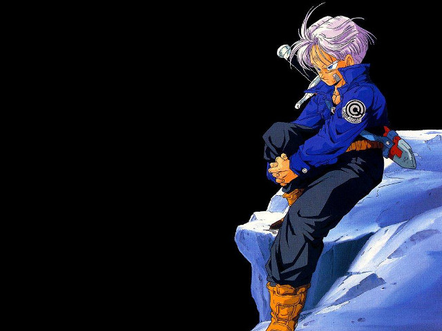 Man sitting snow covered mountain free wallpaper - medium preview image