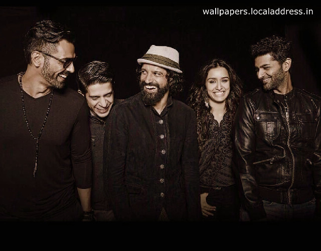 Group smiling camera black background free wallpaper - medium preview image