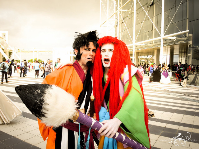 Costumed people street corner crowd free wallpaper - medium preview image