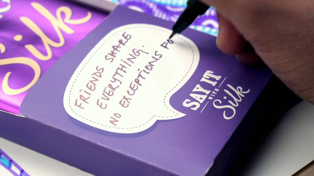 Person writing purple box note free wallpaper - medium preview image