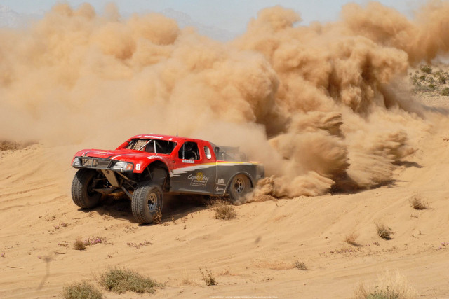 Red truck desert sand dust free wallpaper - medium preview image