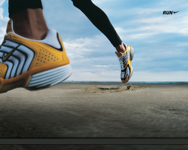 Person running beach blue sky free wallpaper - medium preview image
