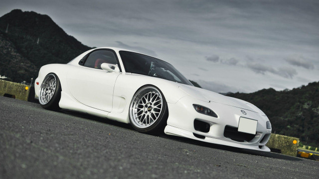 White sports car mountain range free wallpaper - medium preview image
