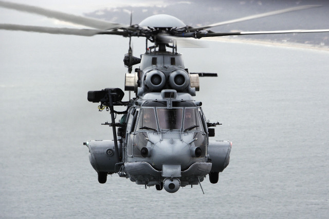 Helicopter flying water sky smoke free wallpaper - medium preview image