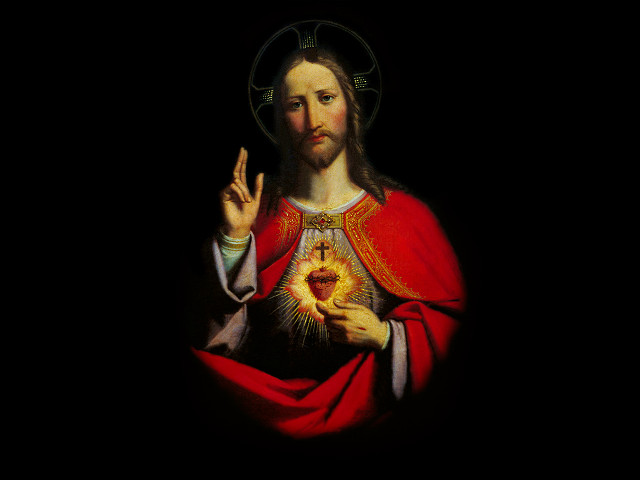 Jesus holding heart cross chest free wallpaper - medium preview image