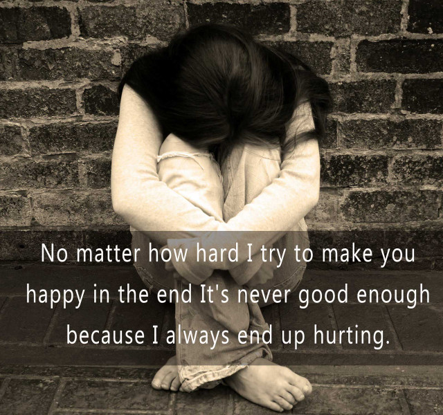 Woman sitting head hands brick free wallpaper - medium preview image