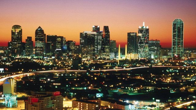 City skyline night orange glow free wallpaper - medium preview image