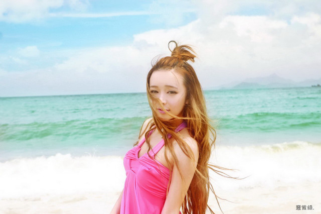 Woman pink dress beach ocean free wallpaper - medium preview image