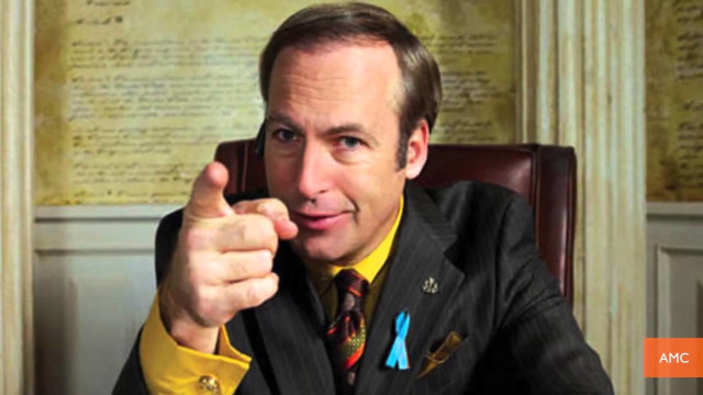 Man suit pointing camera index free wallpaper - medium preview image