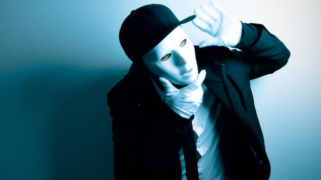 Man white mask black jacket free wallpaper - medium preview image