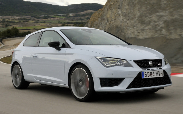 White car driving mountain rock free wallpaper - medium preview image