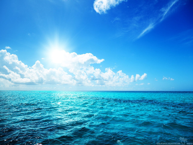 Bright blue sky clouds ocean free wallpaper - medium preview image
