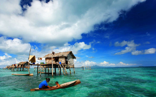 Man child boat house stilts free wallpaper - medium preview image