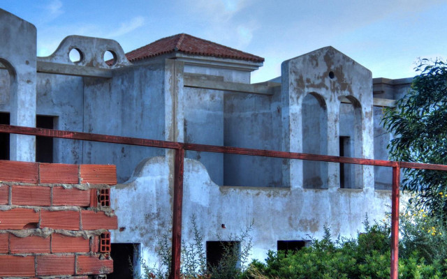Building red fence fire hydrant free wallpaper - medium preview image
