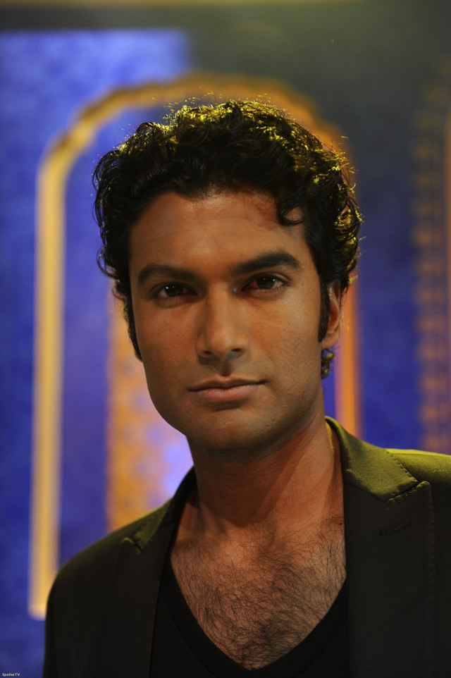 Samikshavad man blackjacket bluebackground golddesign free wallpaper - medium preview image