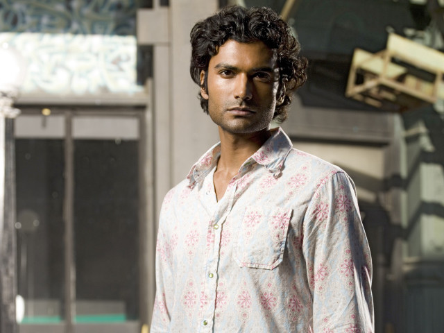 Man curly hair building crane free wallpaper - medium preview image