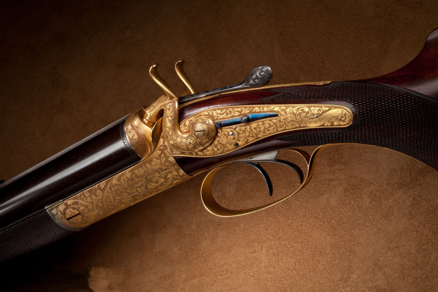 Gun closeup brown background black free wallpaper - medium preview image