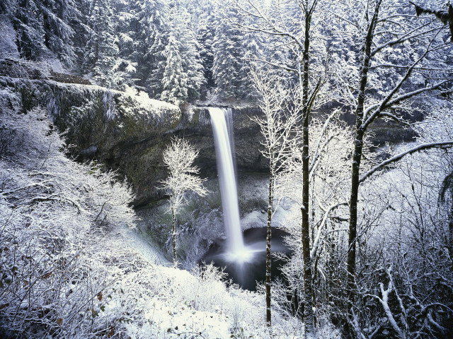Waterfall snowy forest light beam free wallpaper - medium preview image