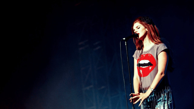 Woman microphone stage red lip free wallpaper - medium preview image