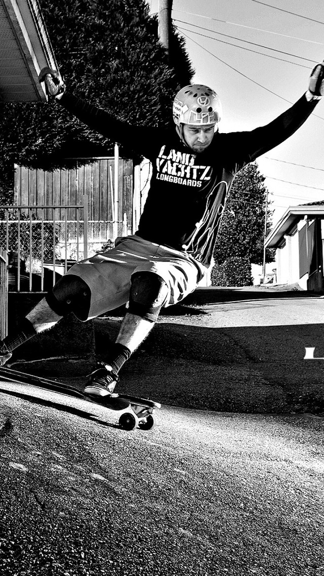 Man skateboard road fence house free wallpaper - medium preview image