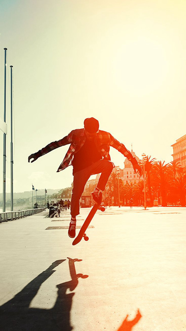 Man skateboard trick air arms free wallpaper - medium preview image