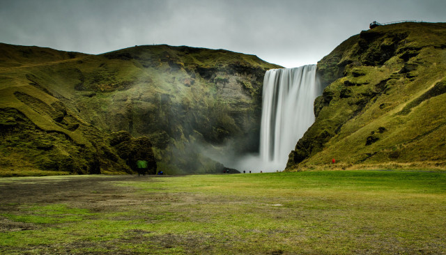 Waterfall person cloudy green field free wallpaper - medium preview image