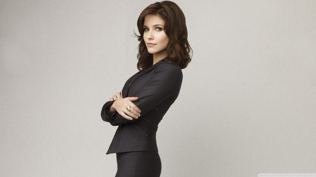 Woman black suit posing arms free wallpaper - medium preview image