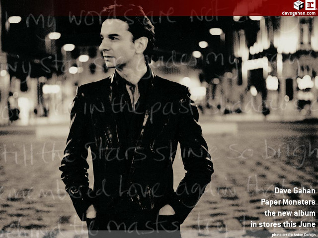 Man standing street night hands free wallpaper - medium preview image